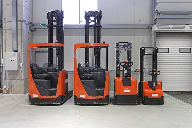 industrial forklifts in operation at a construction site